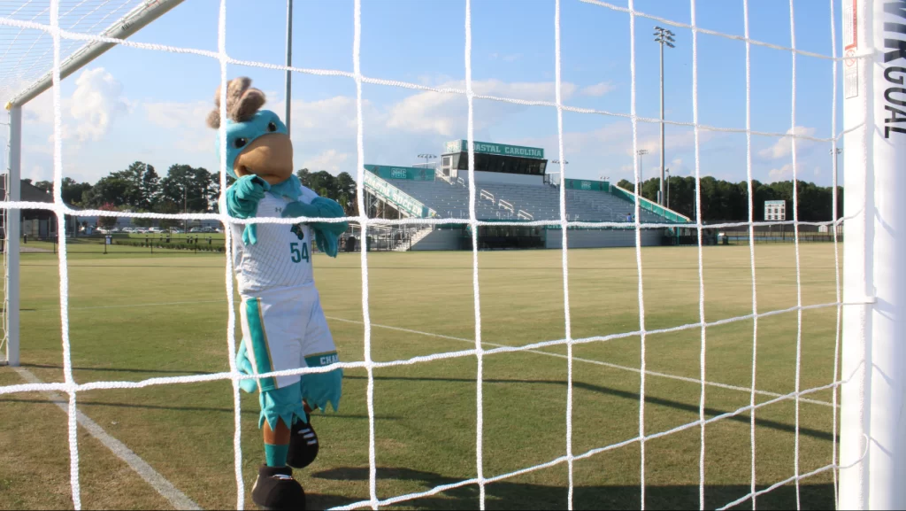 Chauncey celebrates at the new Coastal Carolina University soccer field