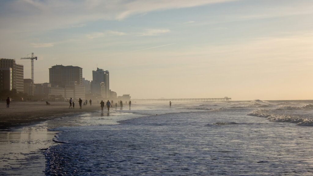 city skyline across the sea during daytime
