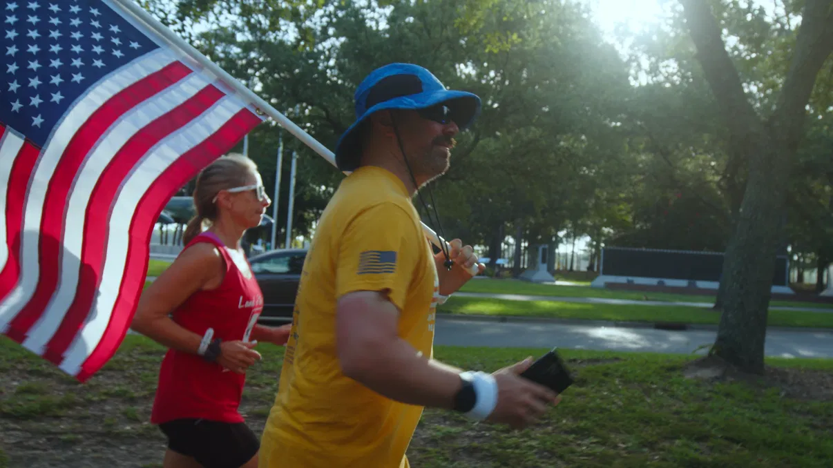 Man passes through Warbird Park on 300 mile run for veteran suicide awareness